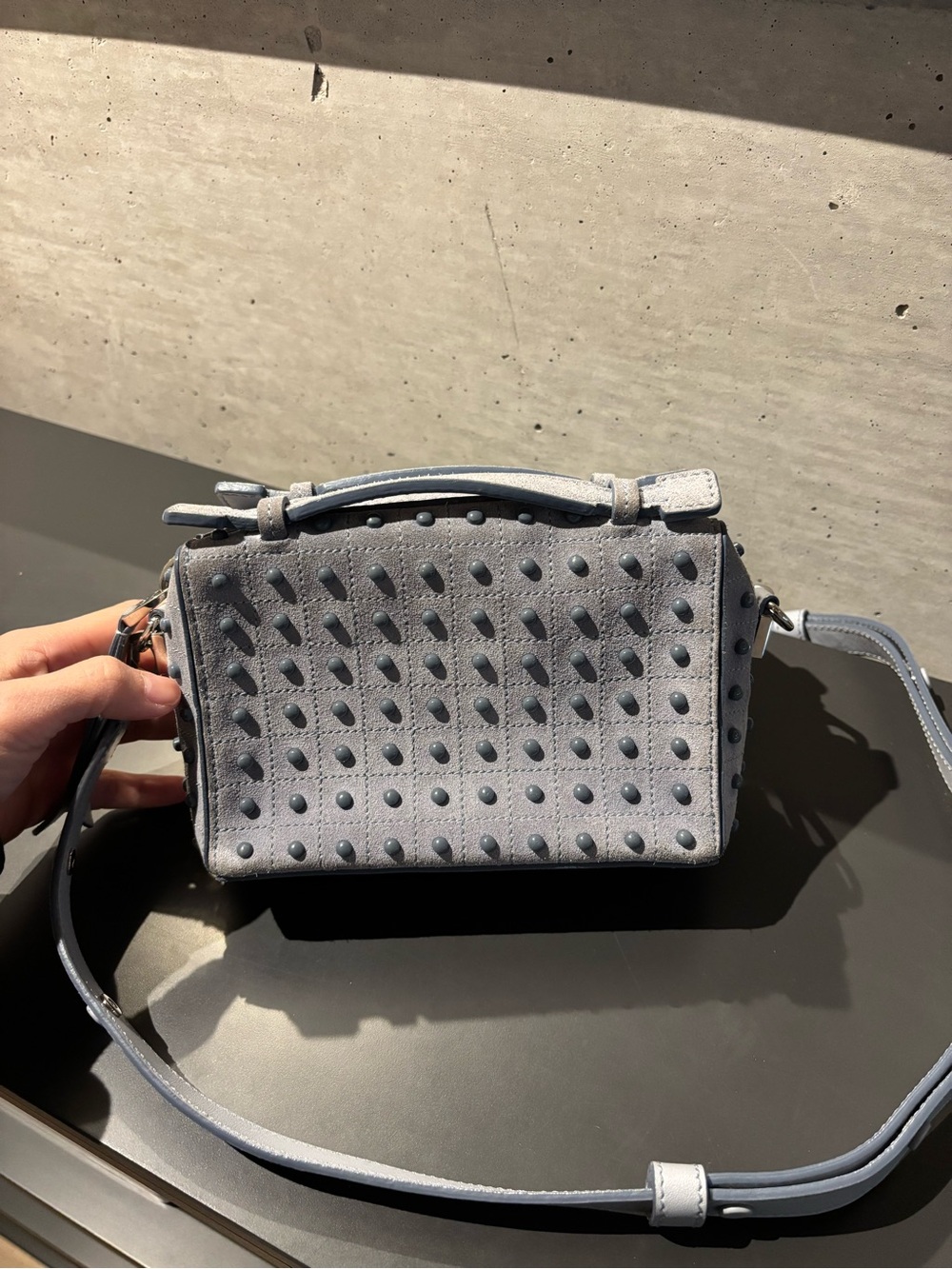 Tod’s Mini Don Bauletto Gommino camera bag in light blue grey suede